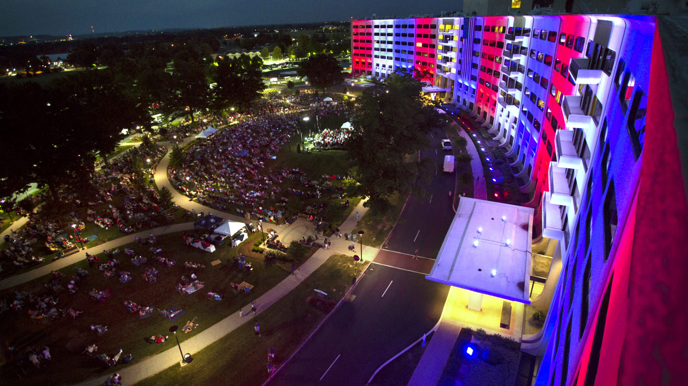 aerial view of patriotic symphony concert outdoors at hospital